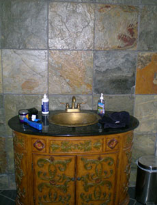bathroom sink and tile inside sleeper family cave house in 

festus missouri