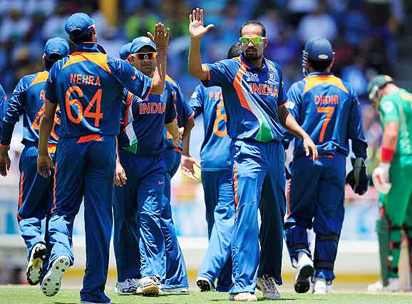 Photo number 1 in the cricket slideshow Match 5: India vs South Africa. Photo caption, "  Yusuf Pathan (CR) celebrates with team-mates after taking the wicket of Loots Bosman during the ICC World Twenty20 match between South Africa and India played at The Beausejour Cricket Ground in Gros Islet. (Emmanuel  Dunand/AFP/Getty Images) "