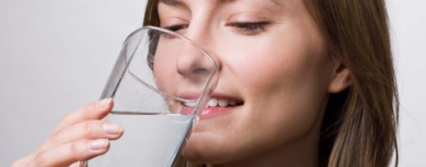 Woman drinking water (ThinkStock)