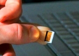 Man's Finger Is a USB Drive