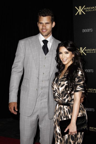 Kim Kardashian and Kris Humphries, NBA basketball player, at the Kardashian Kollection launch party in Montecito, Calif., days before their reality TV mega-wedding in August. Less than 75 days later, divorce papers are filed. (AP Photo/Matt Sayles)