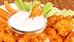 Photo: Chicken hot wings and dipping sauce (Thinkstock)