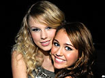 Taylor Swift and Miley Cyrus (Kevin Mazur/WireImage.com)