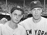 Dom DiMaggio of the Boston Red Sox, left, and his brother Joe DiMaggio of the New York Yankees are shown, in this July 12, 1949 file photo. Dom DiMaggio, a seven-time All Star who still holds the record for the longest consecutive game hitting streak in Boston Red Sox history died early Friday morning May 8, 2009 at his Massachusetts home. He was 92. (AP Photo/Ray Howard, File)