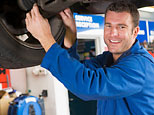 An auto repair technician (iStockPhoto)