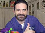 In this Dec. 6, 2002 file photo,TV pitchman Billy Mays poses with some of his cleaning products at his Palm Harbor, Fla., home. (AP)