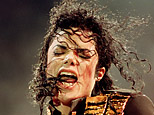 In this Aug. 29, 1993 file photo, pop singer Michael Jackson performs during his 'Dangerous' concert in National Stadium, Singapore. (AP Photo/C.F. Tham, file)