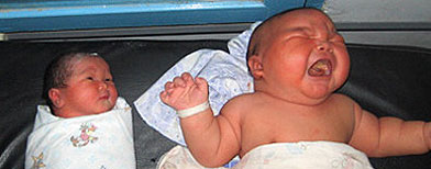 Indonesian woman has given birth to an 8.7-kilogramme (19.2-pound) baby boy (AFP)
