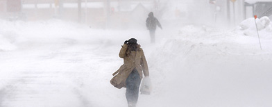 Pedestrians walk during a snowstorm in Alexandria, Virginia (Alex Wong/Getty Images)