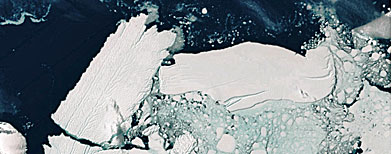 In this satellite image released by Commonwealth of Australia, a 97-kilometer (60 mile) long iceberg known as B9B, right, crashes into the Mertz Glacier Tongue, left, in the Australian Antarctic Territory on Feb. 20, 2010. The collision created a new 78-kilometer (48 mile) long iceberg. (AP Photo/Commonwealth of Australia)