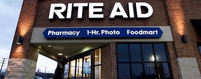 A customer enters a Rite Aid  store in Detroit (AP Photo/Paul Sancya)