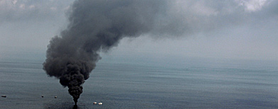 A smoke rises from a controlled oil burn near the site of the Deepwater Horizon oil spill. (AP Photo/Jae C. Hong)