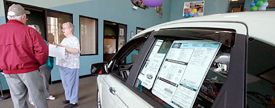 Customers at a Vermont car dealership. (AP Photo/Toby Talbot)