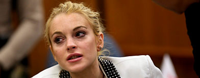 In this Oct. 16, 2009 file photo, Lindsay Lohan appears at her  hearing inside a Beverly Hills, Calif., for a progress report stemming  from a 2007 drunken driving case. (AP Photo/Nick Ut, file)