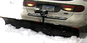 Man turns car into snowplow (AP)