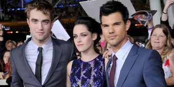 Robert Pattinson, Kristen Stewart and Taylor Lautner arrive at 'The Twilight Saga: Breaking Dawn - Part 1' Premiere at Nokia Theatre L.A. Live on November 14, 2011 in Los Angeles, California. (Gregg DeGuire/FilmMagic)