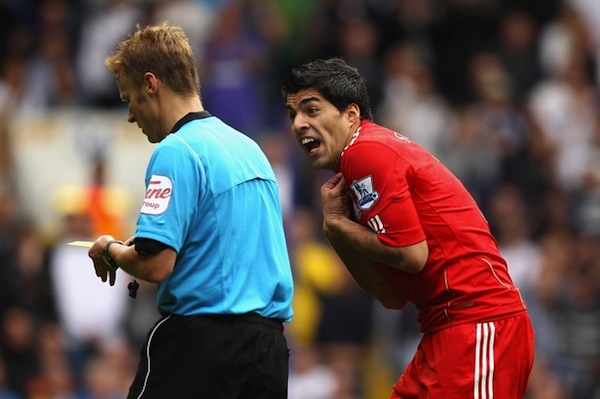 Liverpool's Suarez charged with improper conduct by FA