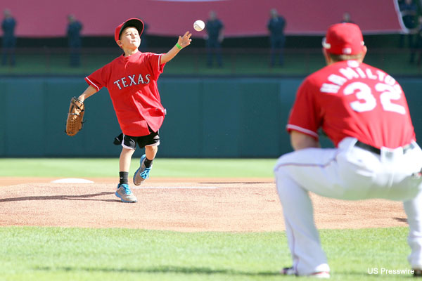 little_cooper_stone_delivers_first_pitch_before_rangers_game.jpg
