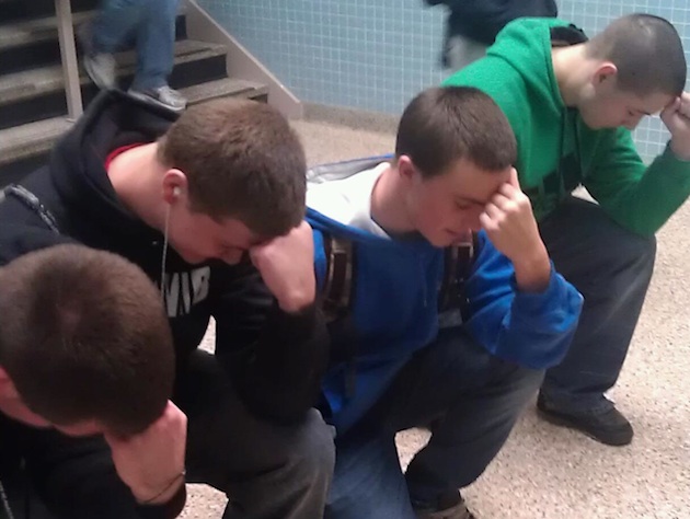 Riverhead High students Tebowing (Connor Carroll photo)