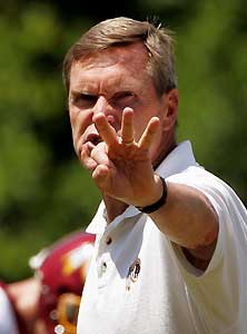 Raiders hire Wylie as OL coach