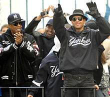 Yankees player Alex Rodriguez, right, and entertainer Jay-Z celebrate on a float during a ticker-tape parade in 2009.