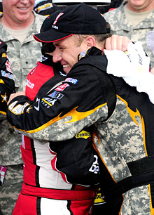 New Hampshire winner Ryan Newman (R), is congratulated by team owner and second place finisher, Tony Stewart.