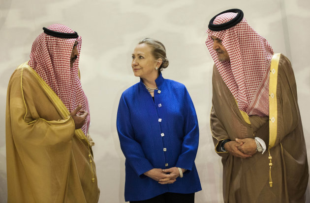 Saudi Foreign Minister Prince Saud Al-Faisal, right, U.S. Secretary of State Hillary Clinton and Kuwaiti Foreign Minister Sheikh Sabah Khaled al-Hamad Al-Sabah chat prior to a group photo before a US-