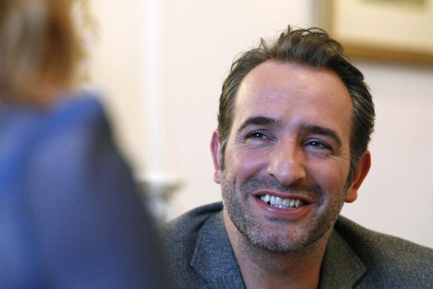 French actor Jean Dujardin addresses reporters during an interview with the Associated Press in Paris, Tuesday, Jan. 24, 2012. The movie, 'The Artist', in which Jean Dujardin plays main role, is nominated 10 times for the Oscar, amongst them writing and directing nominations for French filmmaker Michel Hazanavicius, a best-actor honor for Jean Dujardin and a supporting-actress nod for Berenice Bejo. (AP Photo/Remy de la Mauviniere)