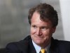 Bank of America Chief Executive Brian Moynihan smiles during an interview in Hong Kong