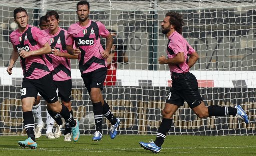 Juventus Pirlo celebrates with his teammates during their Italian Serie A soccer match against Siena in Siena