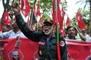 Members of Bangladesh Muktijoddha Sangsad, a welfare association for combatants who fought during the war for independence from Pakistan in 1971, shout slogans after a war crimes tribunal sentenced Ali Ahsan Mohammad Mojaheed, 65, secretary general of the