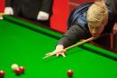 Neil Robertson of Australia plays a shot during the World Snooker Championship 2014 in Sheffield on April 23, 2014