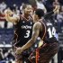 Cincinnati's Dion Dixon (3) and Ge'Lawn Guyn (14) celebrate after defeating Florida State 62-56 in the second half of a third-round NCAA college basketball tournament game on Sunday, March 18, 2012, in Nashville, Tenn. (AP Photo/Mark Humphrey)