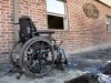 FILE - In this Oct 23, 2005, file photo a wheelchair sits outside St. Rita's Nursing Home in St. Bernard's Parish, La., after Hurricane Katrina. Nearly seven years after the hurricane exposed the vulnerability of nursing homes, serious shortcomings persist. “We identified many of the same gaps in nursing home preparedness and response,” investigators from the inspector general’s office of the Department of Health and Human Services wrote in the report being released Monday, April 16, 2012. (AP Photo/Robert F. Bukaty, File)