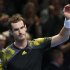 Britain's Murray celebrates winning his men's singles tennis match against France's Tsonga at the ATP World Tour Finals in London