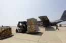 A forklift moves a shipment of weapons that was delivered by a US air force plane on August 29, 2014 at a Lebanese military base at Beirut International Airport