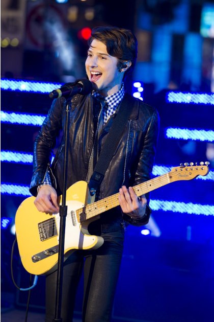 Ryan Follese, from the band Hot Chelle Rae, performs in Times Square during the New Year's Eve celebration,  Saturday, Dec. 31, 2011, in New York. (AP Photo/Charles Sykes)
