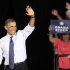 President Barack Obama waves after being introduced at the John S. Knight Center Wednesday, Aug. 1, 2012, in Akron, Ohio. Obama is campaign in Ohio with stops in Mansfield and Akron today. (AP Photo/Tony Dejak)