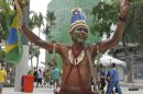 An indigenous man gestures in front of Maracana stadium prior to the soccer Confederations Cup final between Brazil and Spain in Rio de Janeiro, Brazil, Sunday, June 30, 2013. (AP Photo/Tales Azzoni)