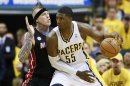 Pacers' Hibbert works against Heat's Andersen during the fourth quarter in Game 4 of their NBA Eastern Conference Final basketball playoff series in Indianapolis