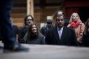 New Jersey Gov. Chris Christie and his wife Mary Pat stand with director of Globe education Patrick Spottiswode, left, as they watch a rehearsal during their visit to the Shakespeare's Globe theatre in London, Tuesday, Feb. 3, 2015. (AP Photo/Matt Dunham)