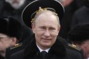 Russian President Putin attends a wreath laying ceremony to mark the Defender of the Fatherland Day in Moscow