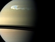 Photo provided by NASA shows an image of Saturn taken in 2010 by the Cassini camera, showing a storm with a latitudinal and longitudinal extent of 10,000 km and 17,000 km, respectively. Imagine being caught in a thunderstorm as wide as the Earth with discharges of lightning 10,000 times more powerful than normal, flashing 10 times per second at its peak