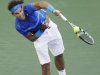 Rafael Nadal of Spain serves to Andy Roddick during a quarterfinal match at the U.S. Open tennis tournament in New York, Friday, Sept. 9, 2011. (AP Photo/Charlie Riedel)