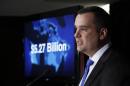 Canada's Industry Minister James Moore speaks during a news conference in Ottawa