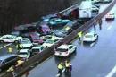 In this image from PennDOT via FoxTV, more than 20 cars are piled up on I-76 in Philadelphia after freezing rain on Sunday, Jan. 18, 2015. Slick roads caused a number of crashes, including collisions that also closed parts of Interstates 95 and 476 in and around Philadelphia. (AP Photo/PennDOT via FoxTV)