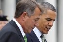 President Barack Obama talks with House Speaker John Boehner of Ohio on Capitol Hill in Washington, Tuesday, March 20, 2012, after attending a St. Patrick's Day luncheon with Irish Prime Minister Enda Kenny. (AP Photo/Pablo Martinez Monsivais)