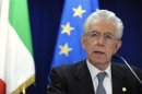 Italy's PM Monti addresses a news conference after an EU leaders summit in Brussels