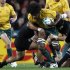 Australia Wallabies' Samo is tackled by New Zealand All Blacks' Weepu during their Rugby World Cup semi-final match in Auckland