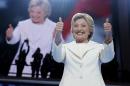 FILE - In this July 28, 2016, file photo, Democratic presidential candidate Hillary Clinton gives her thumbs up as she appears on stage during the final day of the Democratic National Convention in Philadelphia. Every presidential race has its big moments. This one, more than most. (AP Photo/Carolyn Kaster, file)